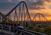 Editorial illustration of a towering steel roller coaster at sunset, used to accompany an investigation into hypercoaster safety.